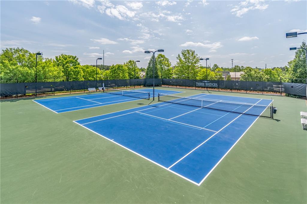 4469 Tacoma Trace Suwanee, GA 30024 - Photo 55 of 62 a tennis court that has yard in front of it