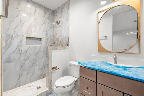 a view of a hallway with windows