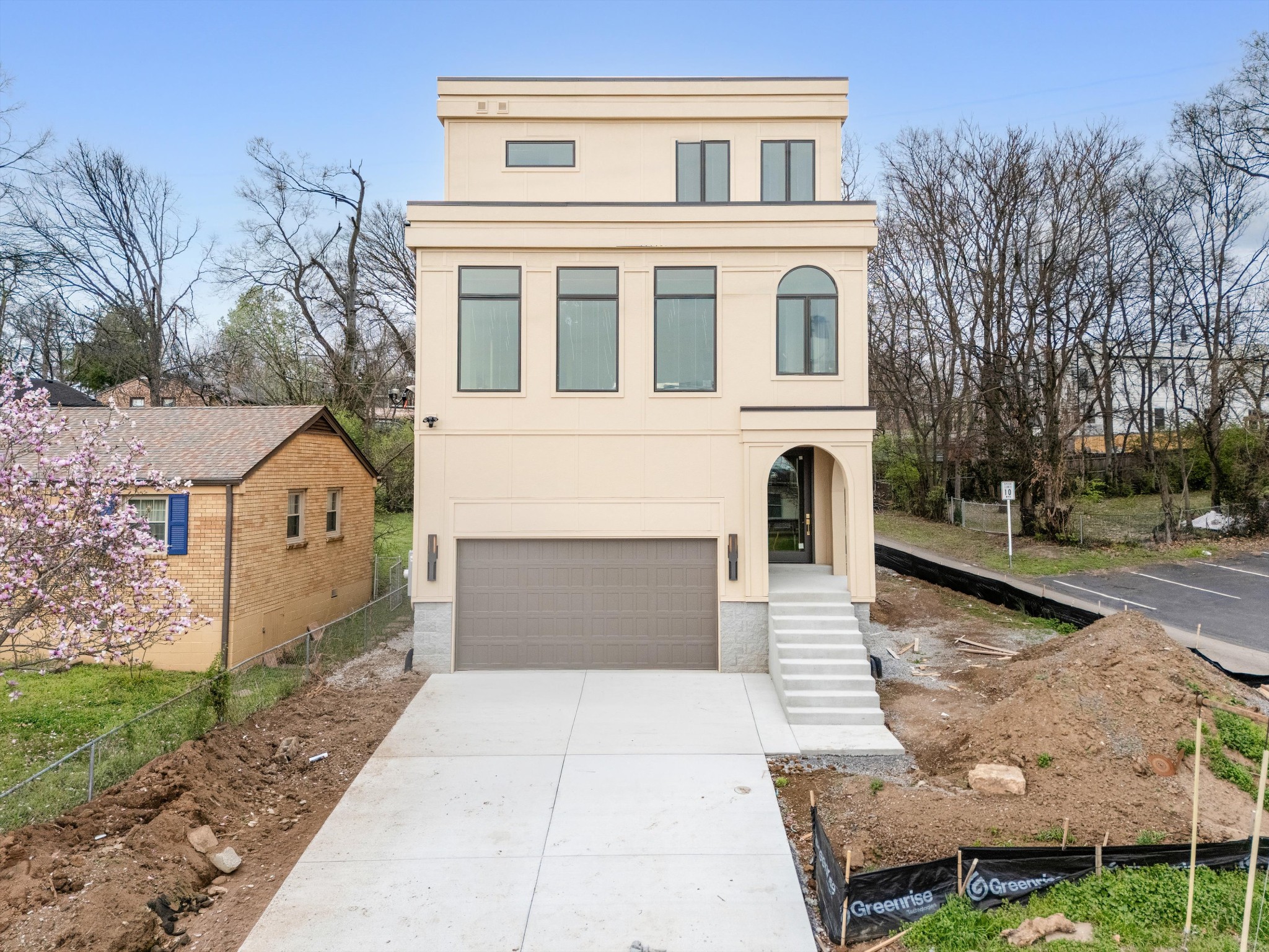 1007 Sevier Street Nashville, TN 37206 - Photo 2 of 55 a front view of a house with garden and trees