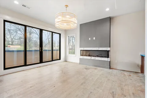 a view of balcony with yard