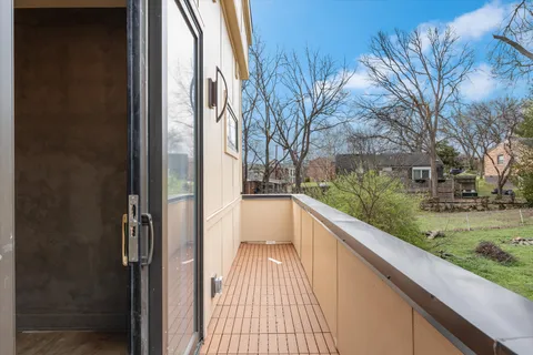 a spacious bathroom with a double vanity sink and a mirror