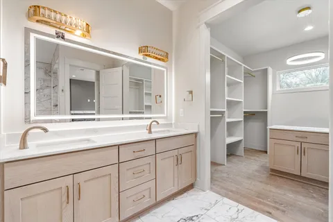 a white bath tub sitting in a bathroom