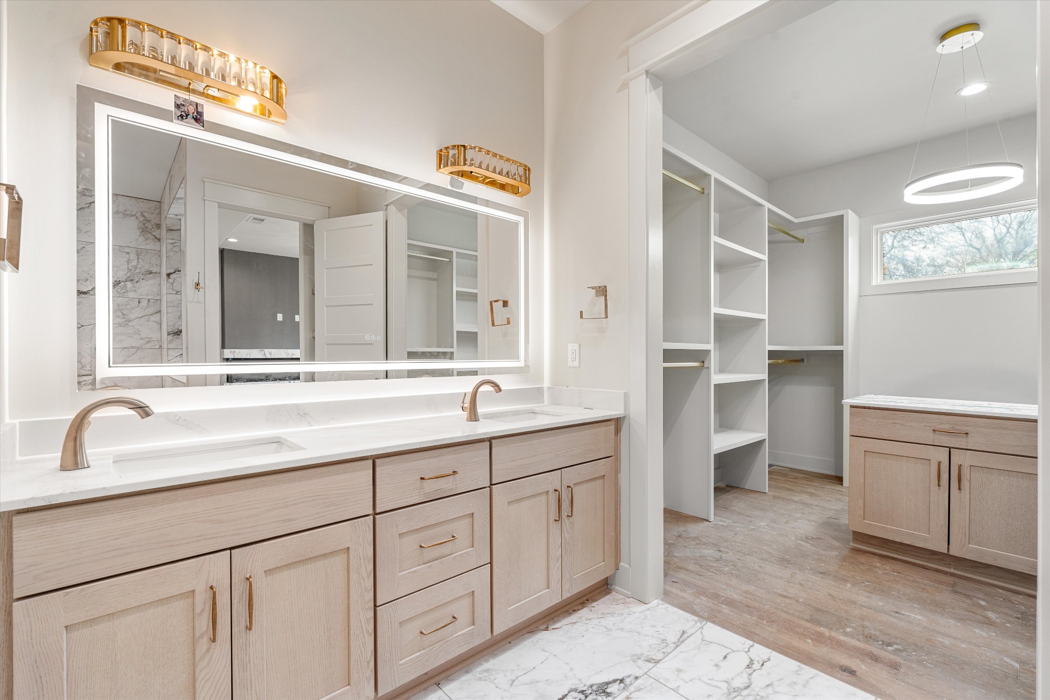 1007 Sevier Street Nashville, TN 37206 - Photo 28 of 55 a spacious bathroom with a granite countertop sink and a mirror