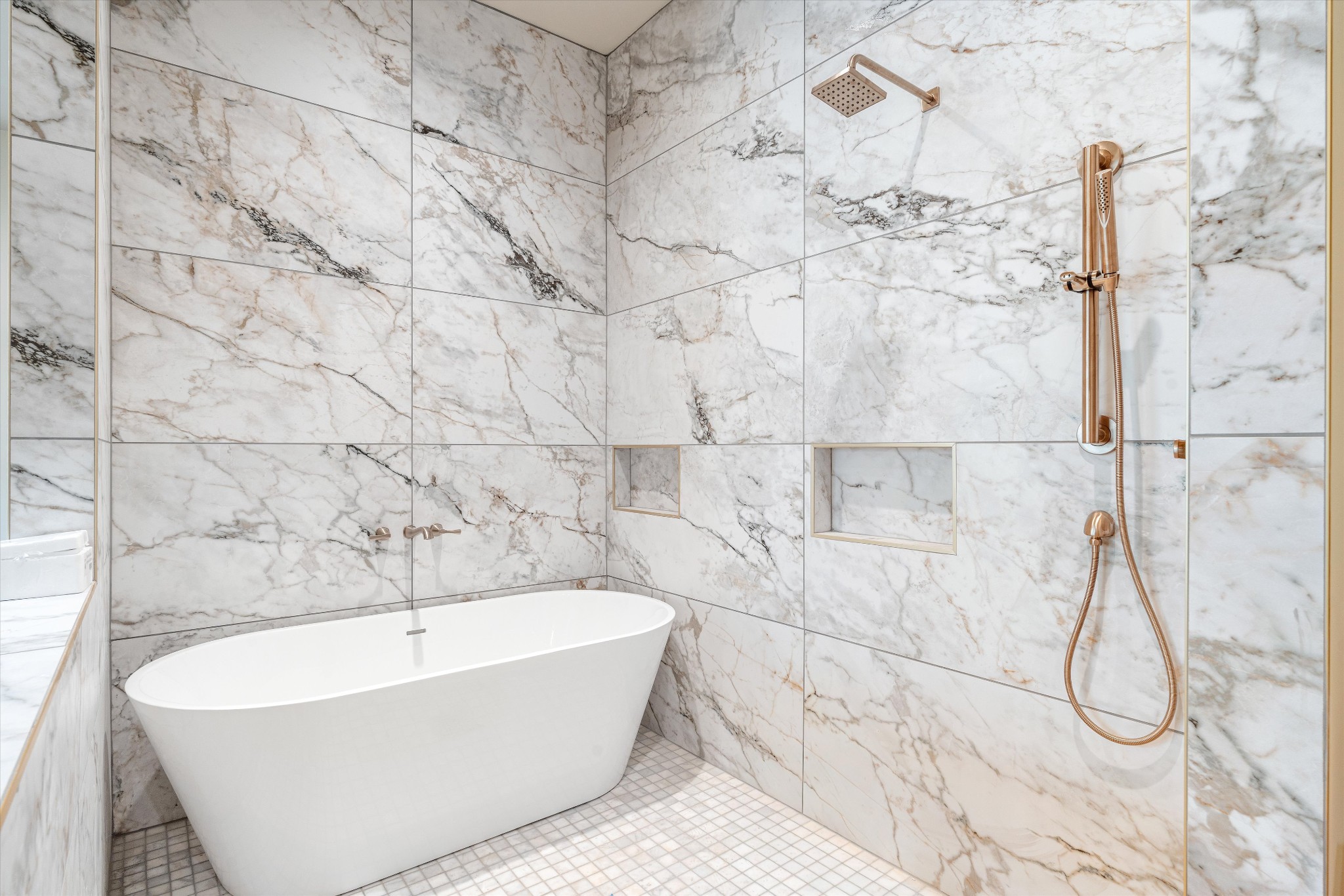 1007 Sevier Street Nashville, TN 37206 - Photo 29 of 55 a bathroom with a bathtub and shower