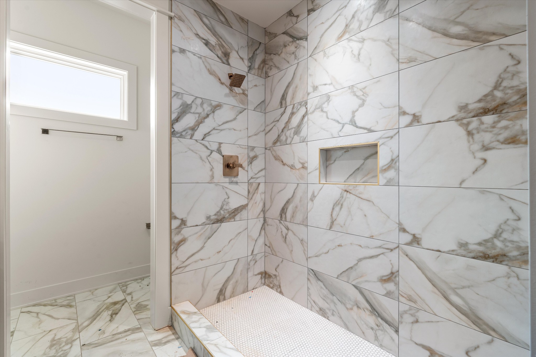 1007 Sevier Street Nashville, TN 37206 - Photo 37 of 55 a bathroom with a shower and toilet