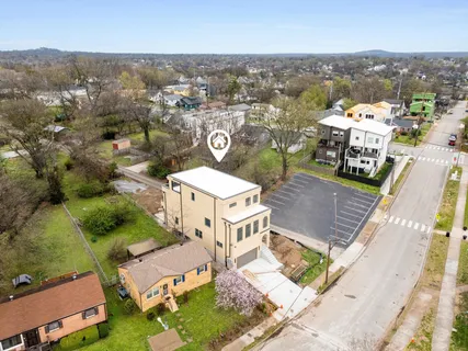 a view of a lake with a building in the background