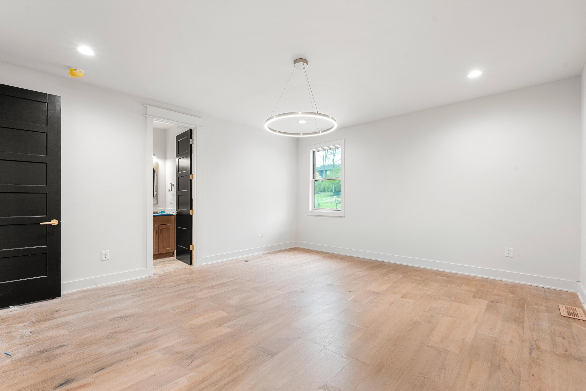 1007 Sevier Street Nashville, TN 37206 - Photo 10 of 55 a view of an empty room with a window