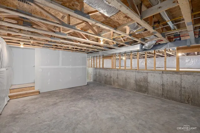 a view of a room with wooden walls