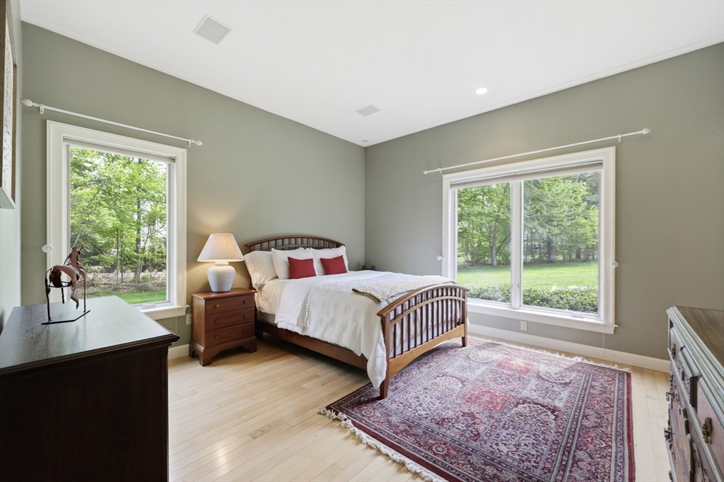 33 Labrie Lane Holyoke, MA 01040 - Photo 19 of 42 a bed room with a bed and a large window