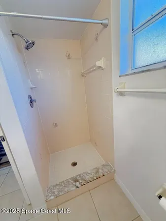 a bathroom with a bath tub