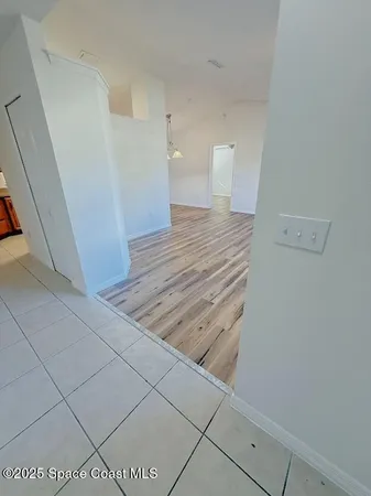 a view of a room with an empty space