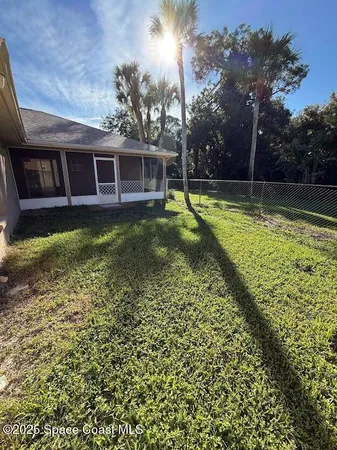 a view of a house with a swimming pool