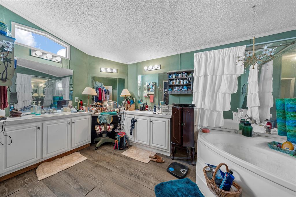 236 Bode Road Elm Mott, TX 76640 - Photo 19 of 33 a room with gym equipment and a large window