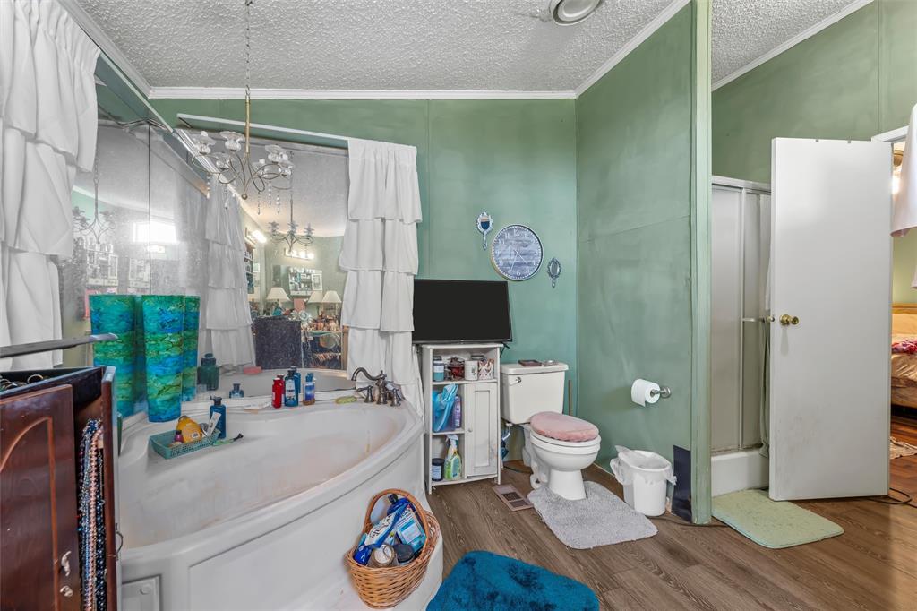 236 Bode Road Elm Mott, TX 76640 - Photo 21 of 33 a bathroom with a sink toilet and shower