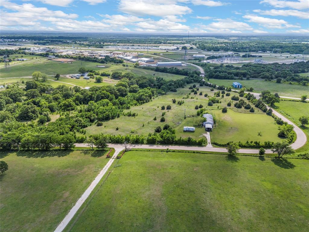 236 Bode Road Elm Mott, TX 76640 - Photo 27 of 33 a view of a lake with a yard