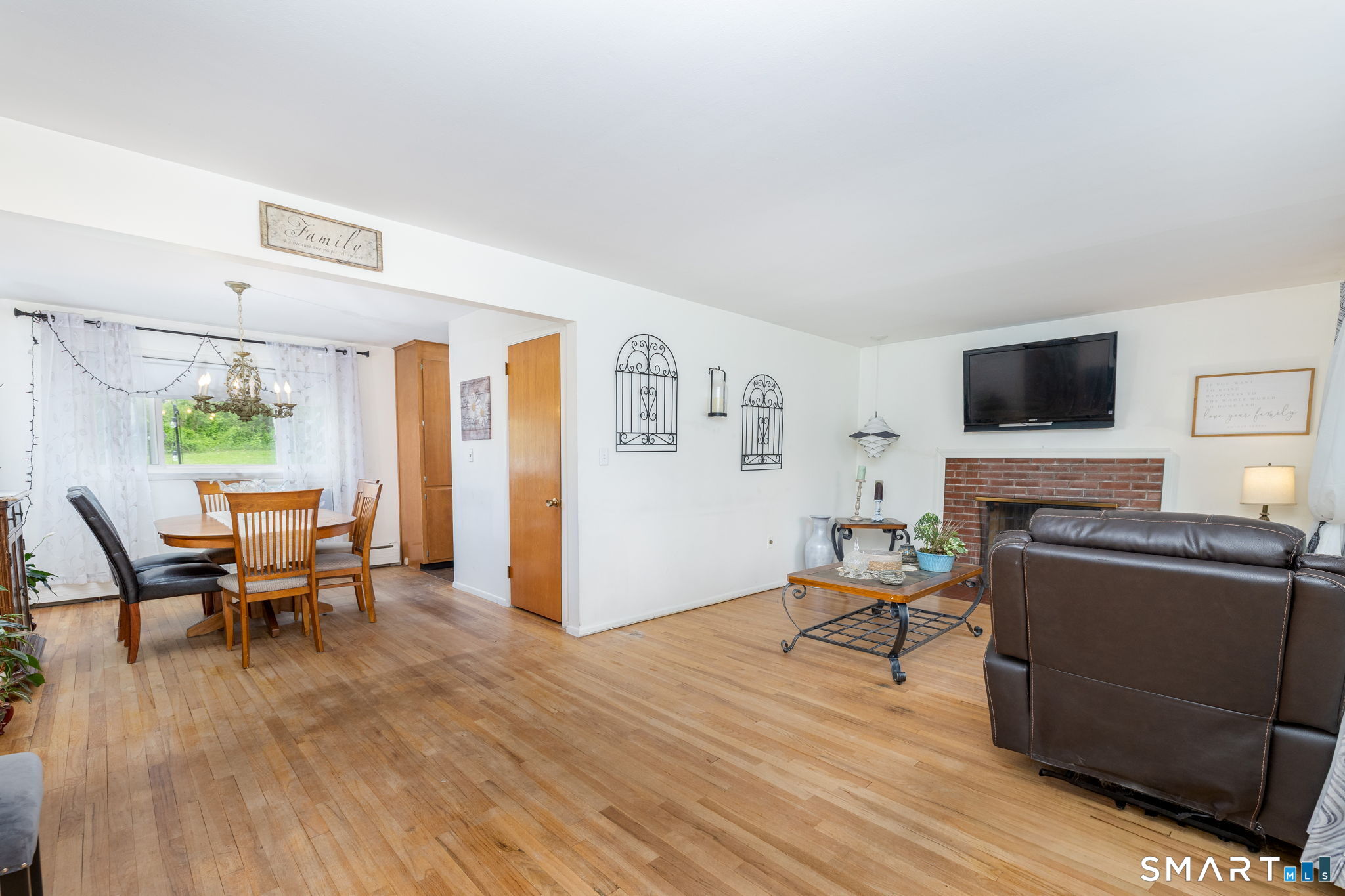 325 Barbara Road Middletown, CT 06457 - Photo 16 of 40 a living room with furniture and a flat screen tv
