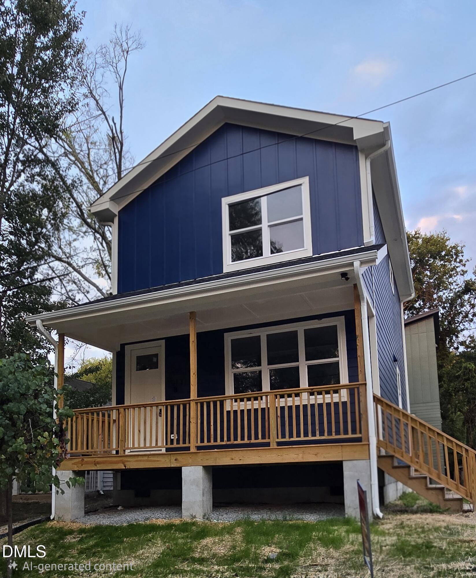 1013 Carroll Street, Unit B Durham, NC 27707 - Photo 1 of 4 a front view of a house with garden