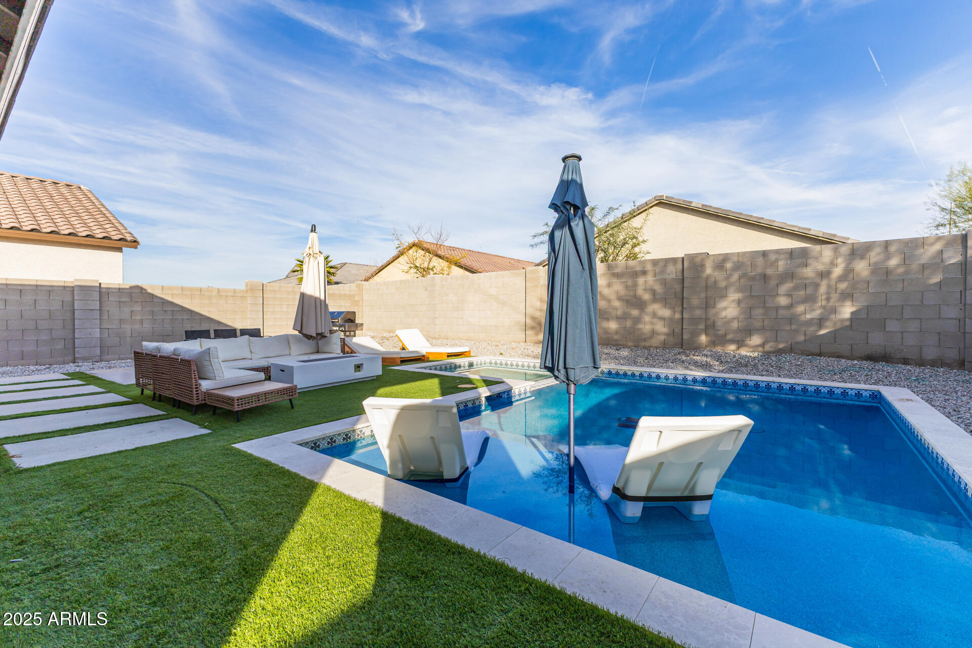 8133 South 64th Lane Laveen, AZ 85339 - Photo 1 of 32 a living room with furniture and a large window