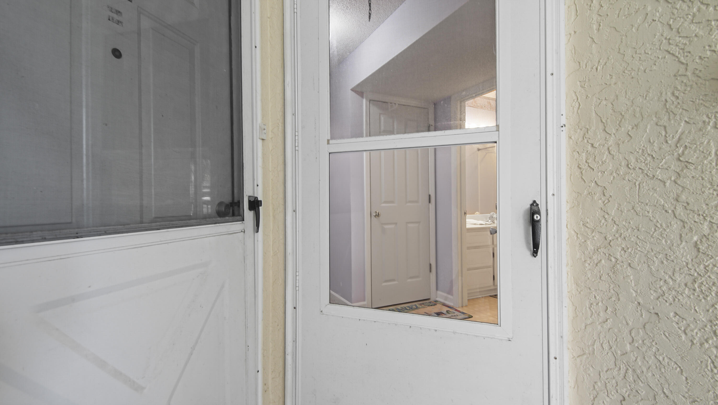 17462 Front Beach Road, Unit 54106 Panama City Beach, FL 32413 - Photo 14 of 32 view of a bathroom from a hallway