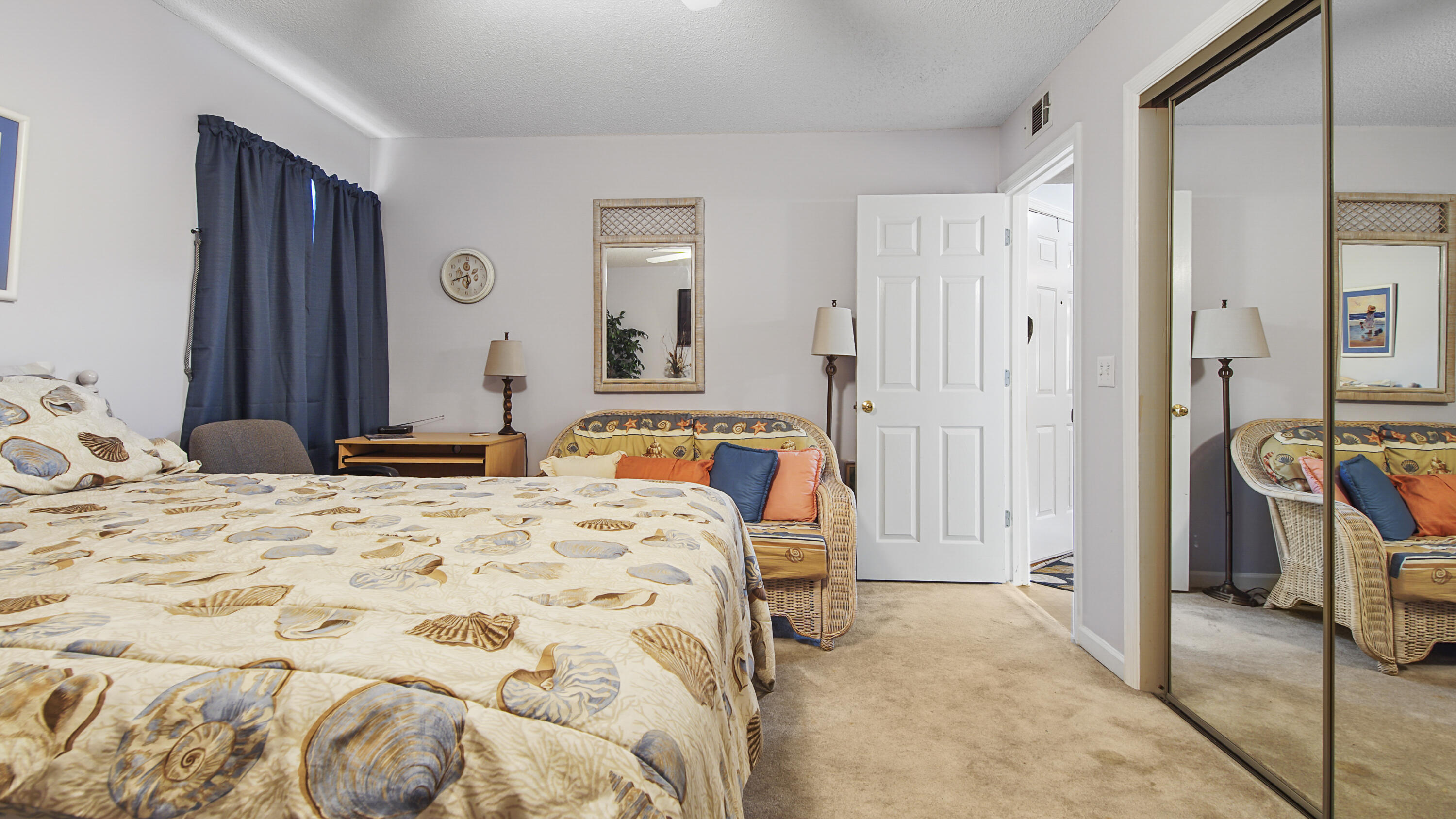 17462 Front Beach Road, Unit 54106 Panama City Beach, FL 32413 - Photo 28 of 32 a bedroom with a bed and a view of bedroom