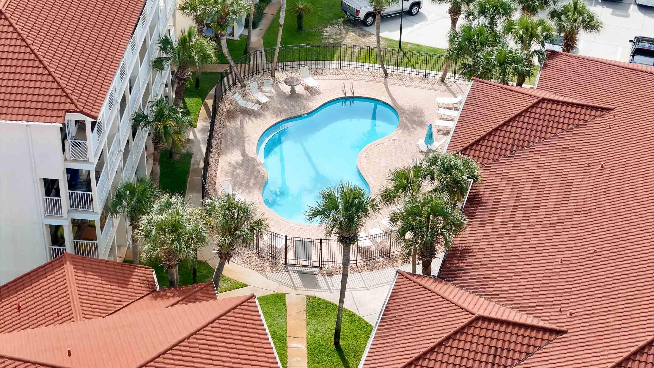 17462 Front Beach Road, Unit 54106 Panama City Beach, FL 32413 - Photo 5 of 32 a view of a backyard with sitting area