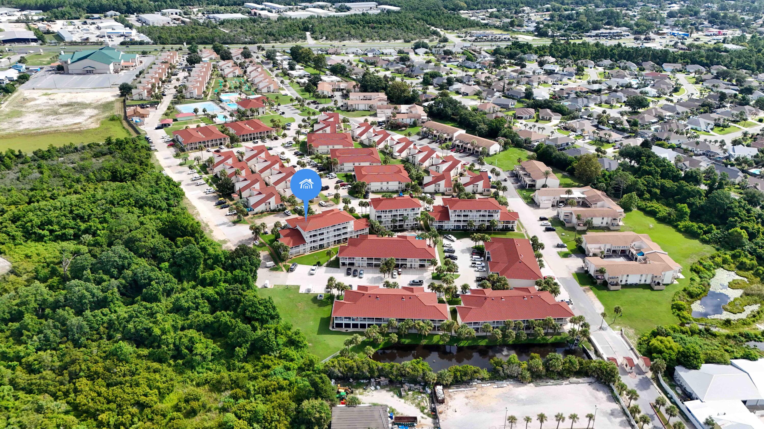 17462 Front Beach Road, Unit 54106 Panama City Beach, FL 32413 - Photo 7 of 32 an aerial view of residential houses with outdoor space