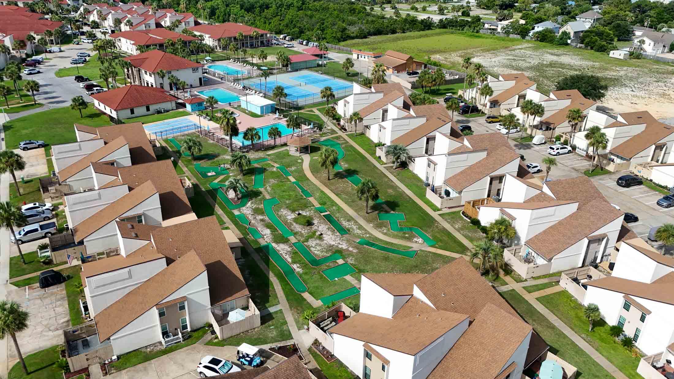 17462 Front Beach Road, Unit 54106 Panama City Beach, FL 32413 - Photo 8 of 32 an aerial view of residential houses with outdoor space and street view
