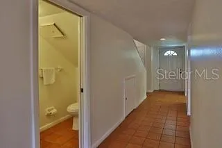 a view of a bathroom with a glass door shower