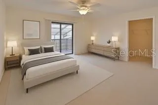 a bedroom with bed and window