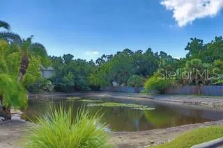 a view of swimming pool with a yard