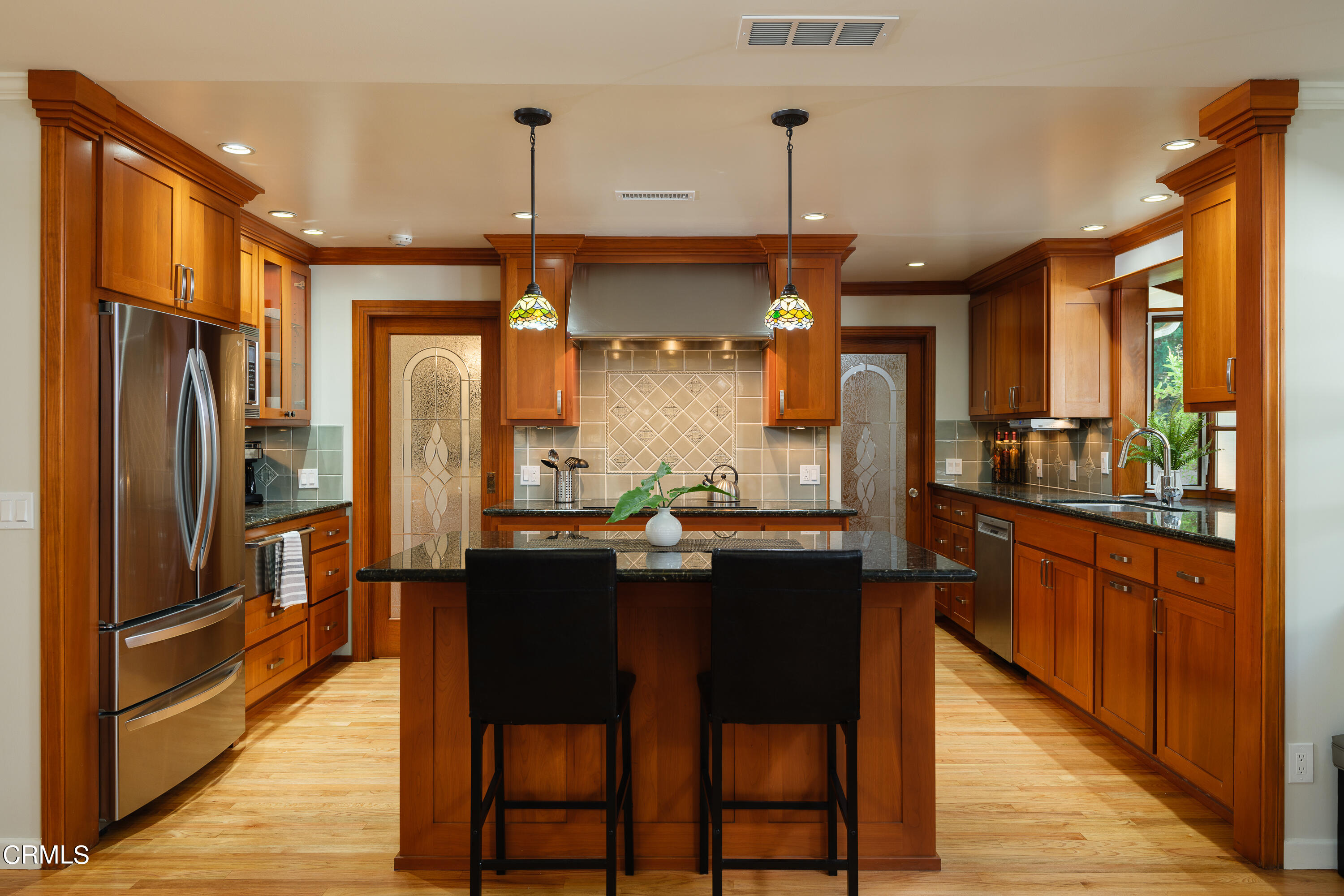 525 Verner Circle Arcadia, CA 91006 - Photo 12 of 45 a kitchen with stainless steel appliances granite countertop a refrigerator a sink a stove and island
