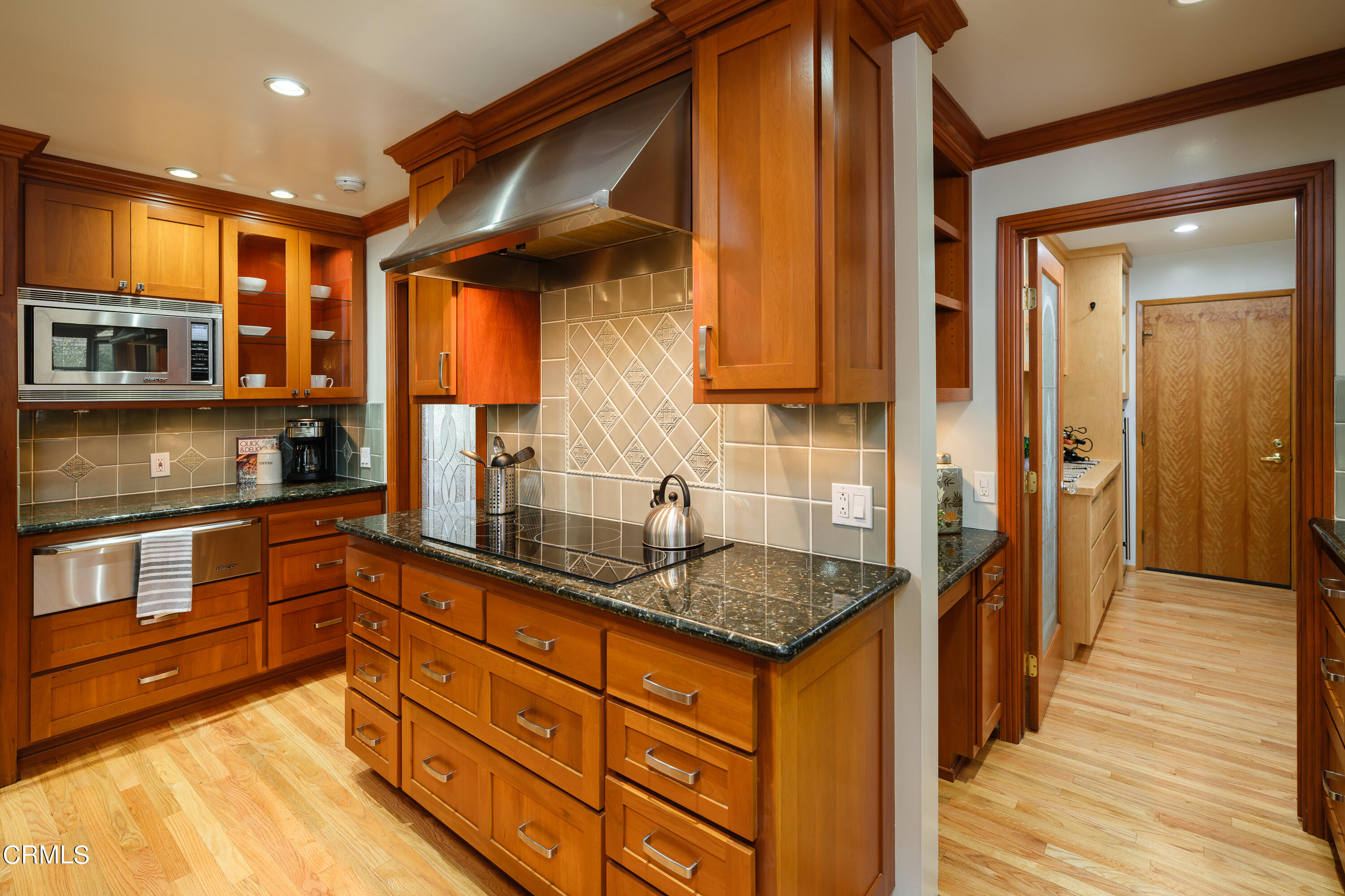 525 Verner Circle Arcadia, CA 91006 - Photo 14 of 45 a kitchen with granite countertop wooden cabinets and a granite counter tops