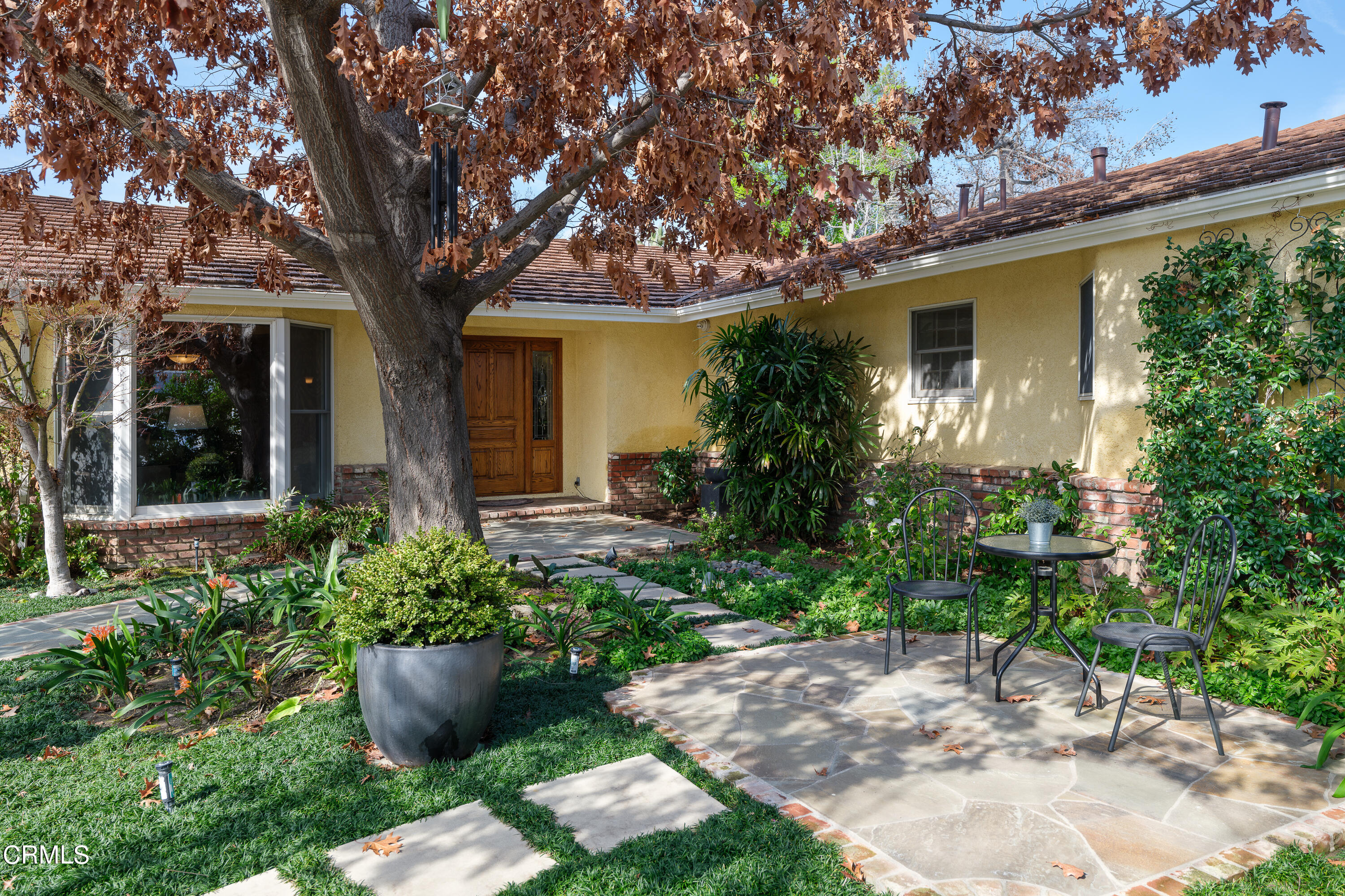 525 Verner Circle Arcadia, CA 91006 - Photo 2 of 45 a front view of a house with a yard and potted plants