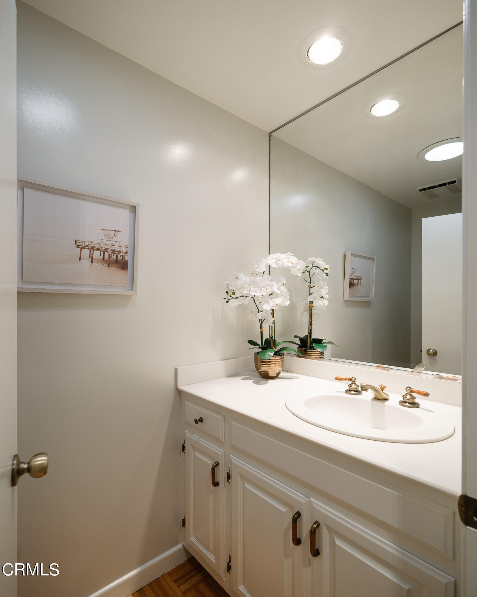 525 Verner Circle Arcadia, CA 91006 - Photo 21 of 45 a bathroom with a sink a vanity and a mirror