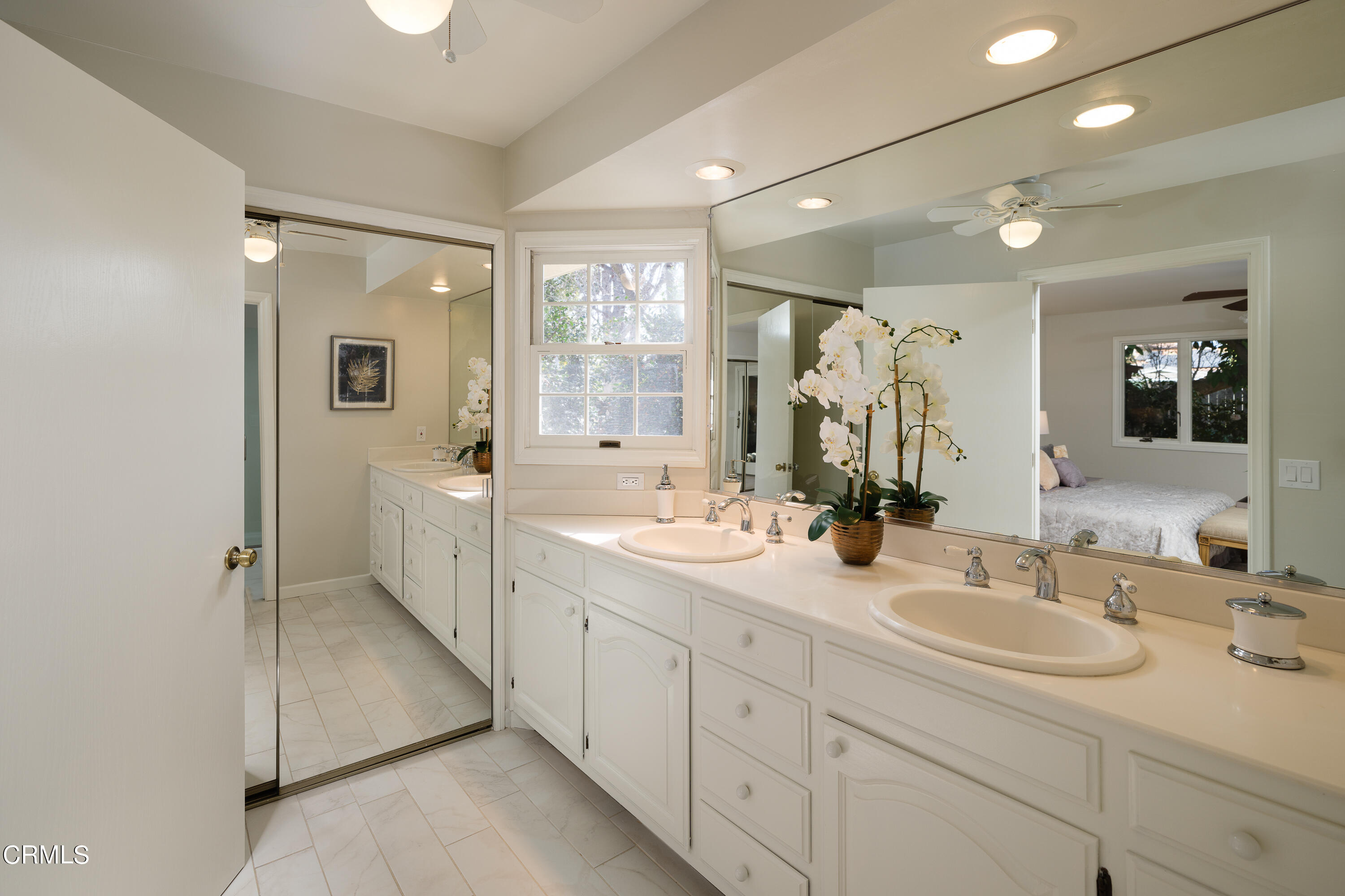 525 Verner Circle Arcadia, CA 91006 - Photo 28 of 45 a bathroom with a sink double vanity granite tub shower and a mirror