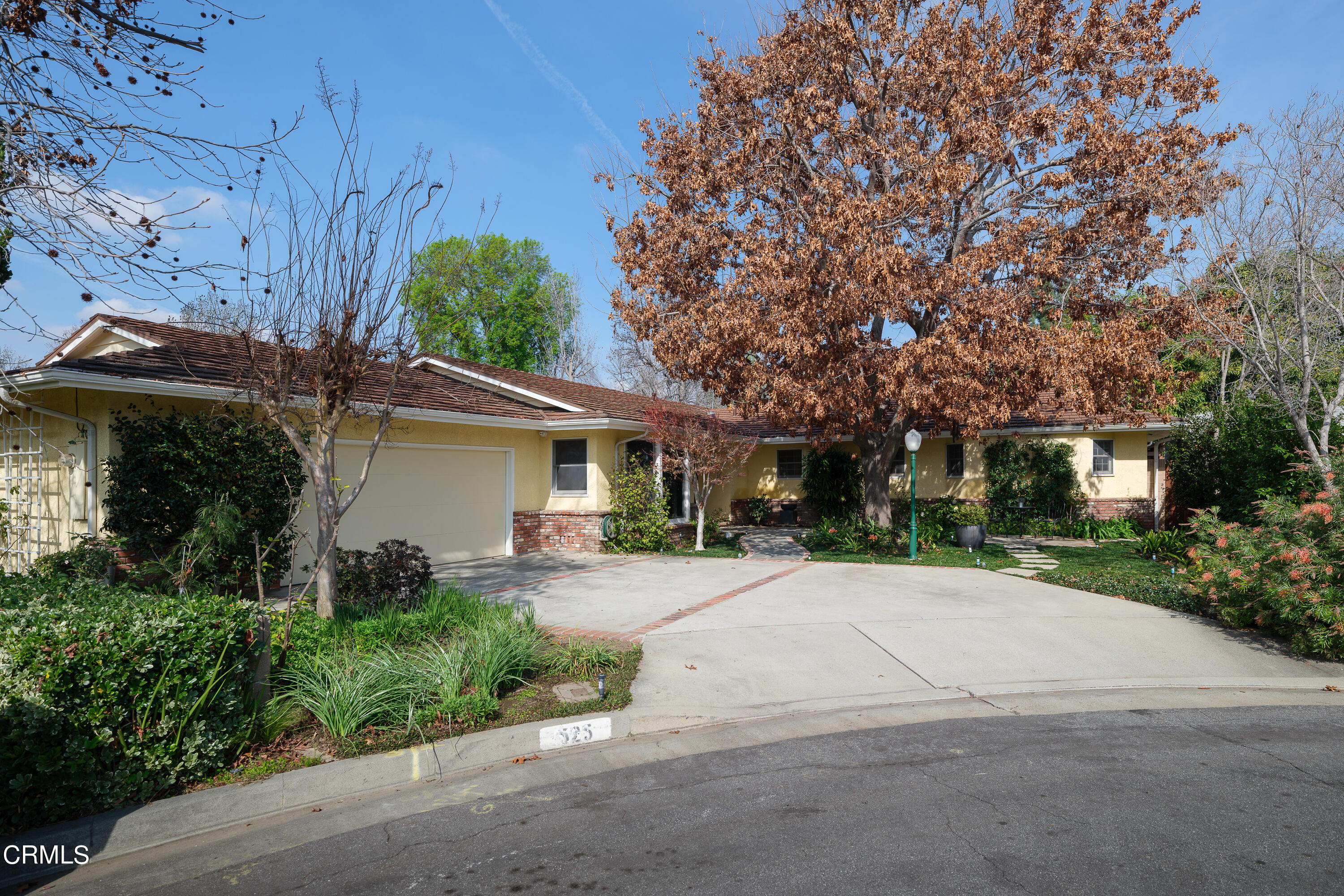 525 Verner Circle Arcadia, CA 91006 - Photo 43 of 45 a front view of a house with a yard and trees