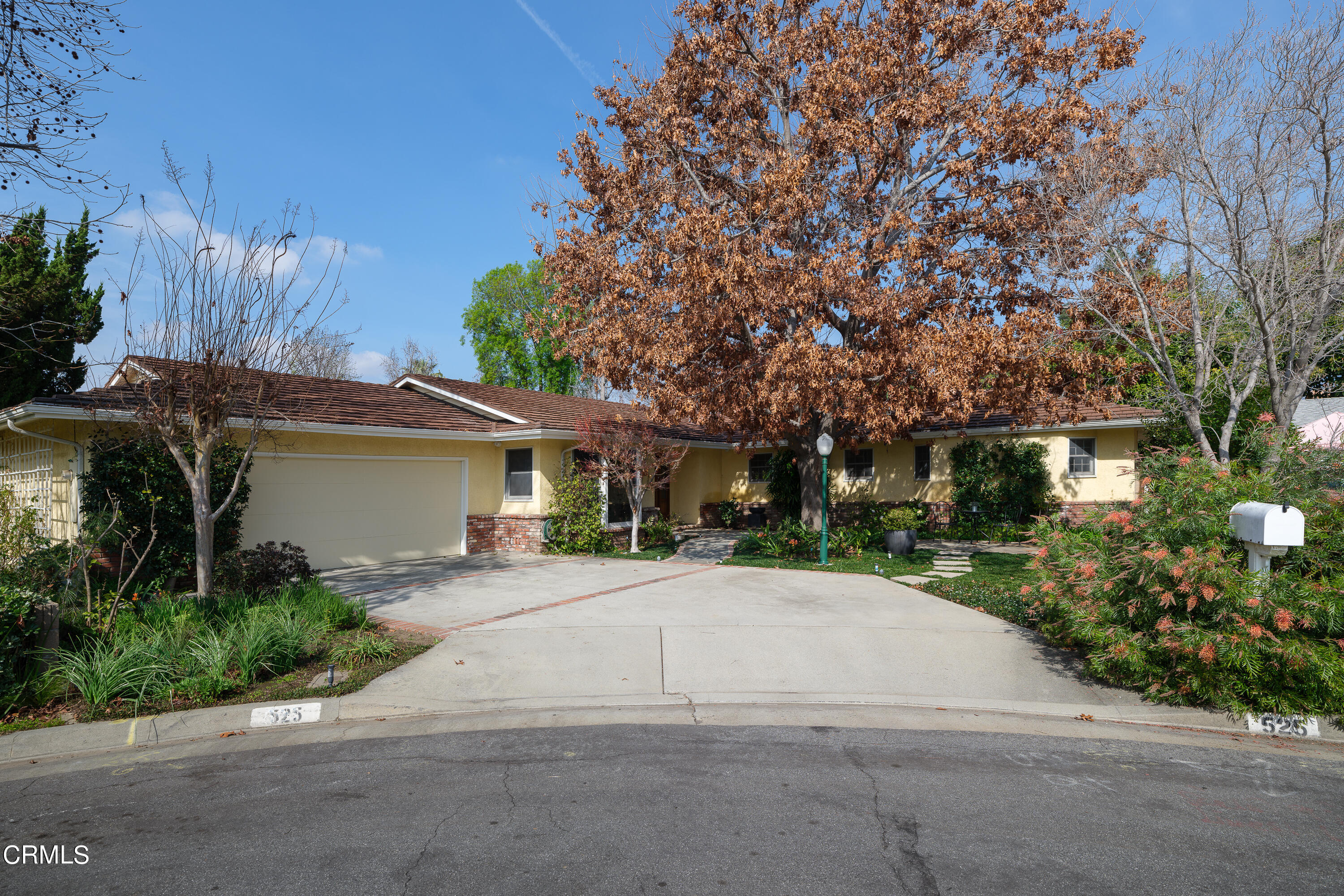 525 Verner Circle Arcadia, CA 91006 - Photo 44 of 45 a front view of a house with a yard and a garage