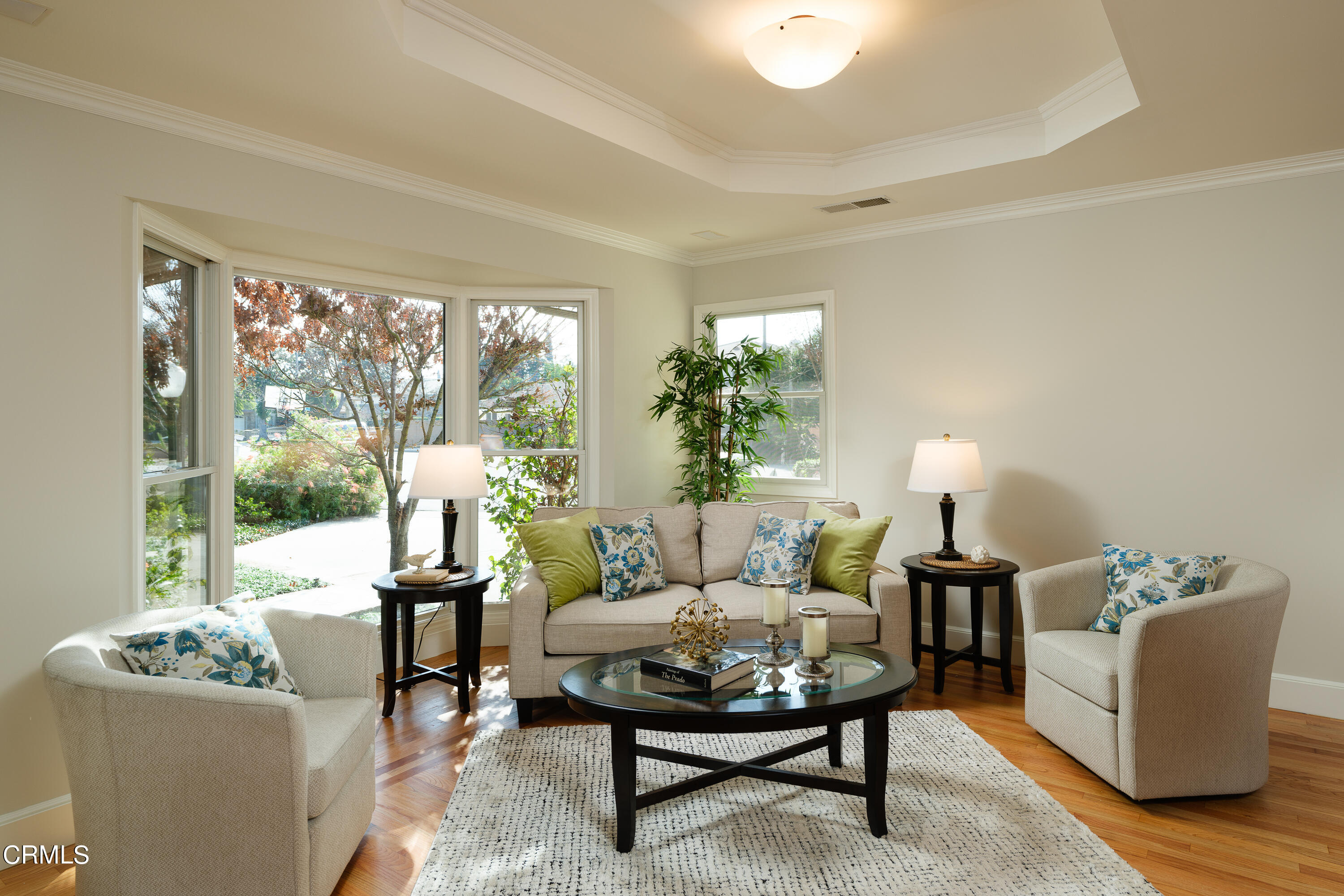 525 Verner Circle Arcadia, CA 91006 - Photo 7 of 45 a living room with furniture and a potted plant next to a window