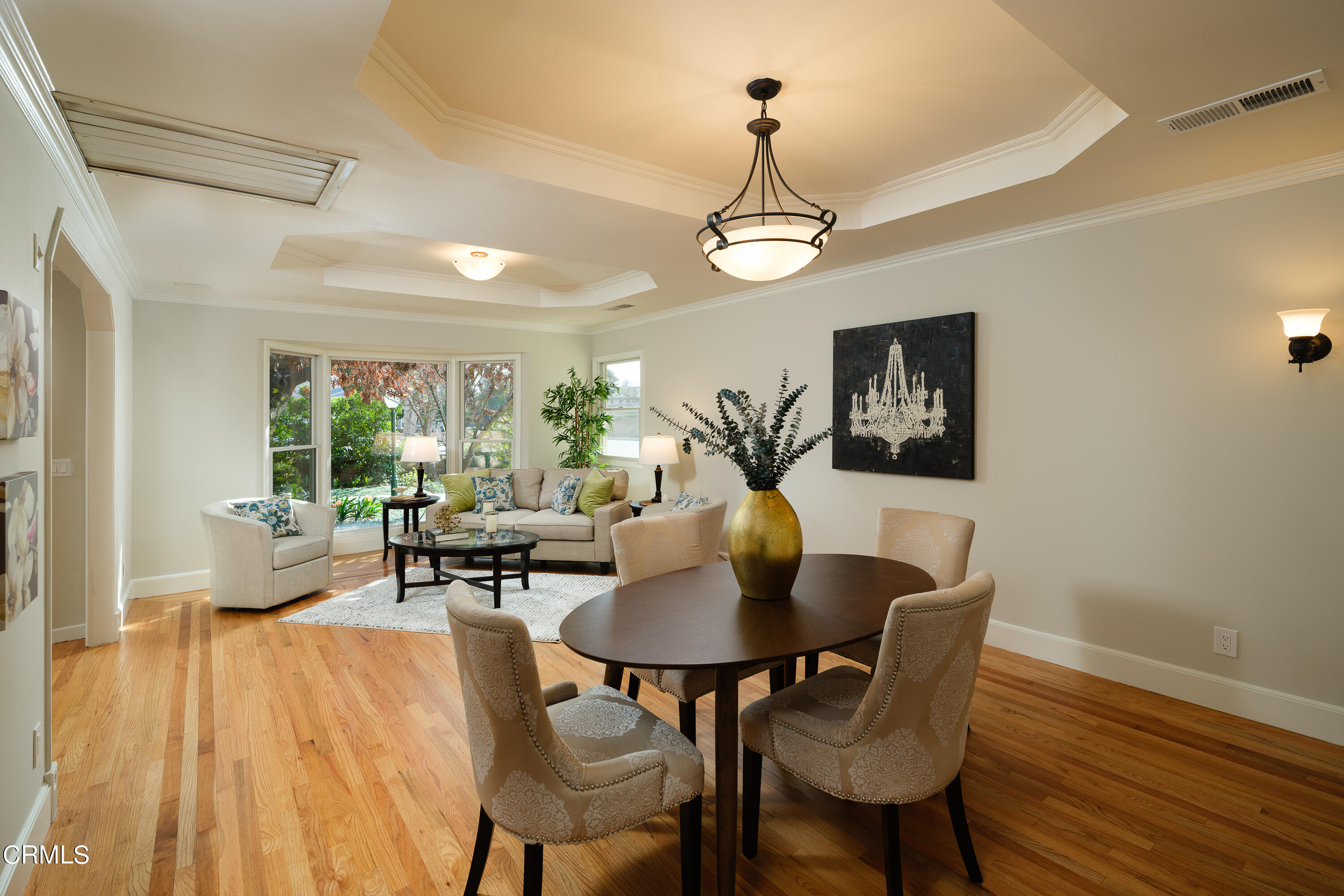 525 Verner Circle Arcadia, CA 91006 - Photo 8 of 45 a living room with dining table a couch and a chandelier