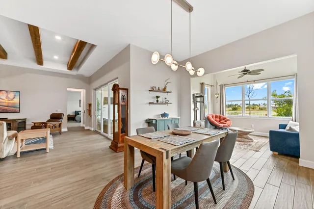 a kitchen with a table and chairs