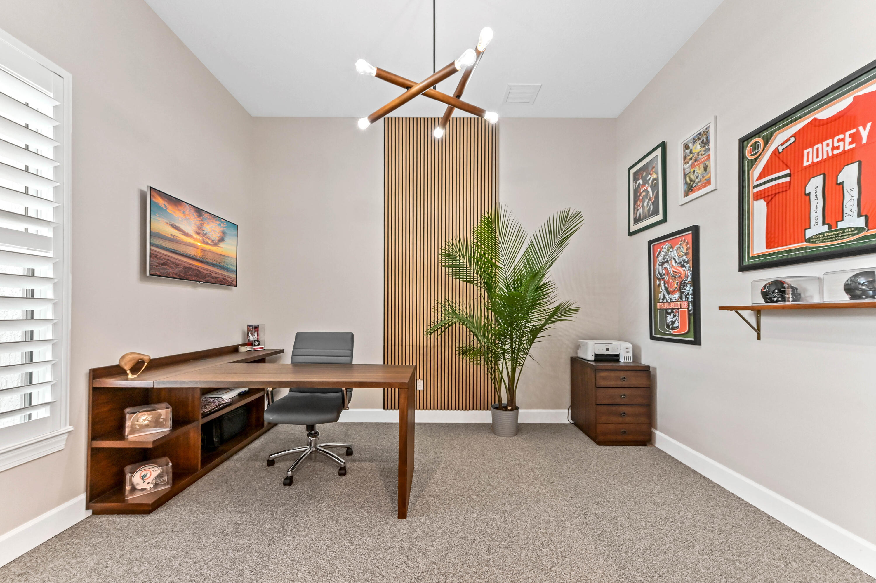 9891 Southwest Legacy Drive Stuart, FL 34997 - Photo 16 of 55 a view of a workspace with furniture and a window