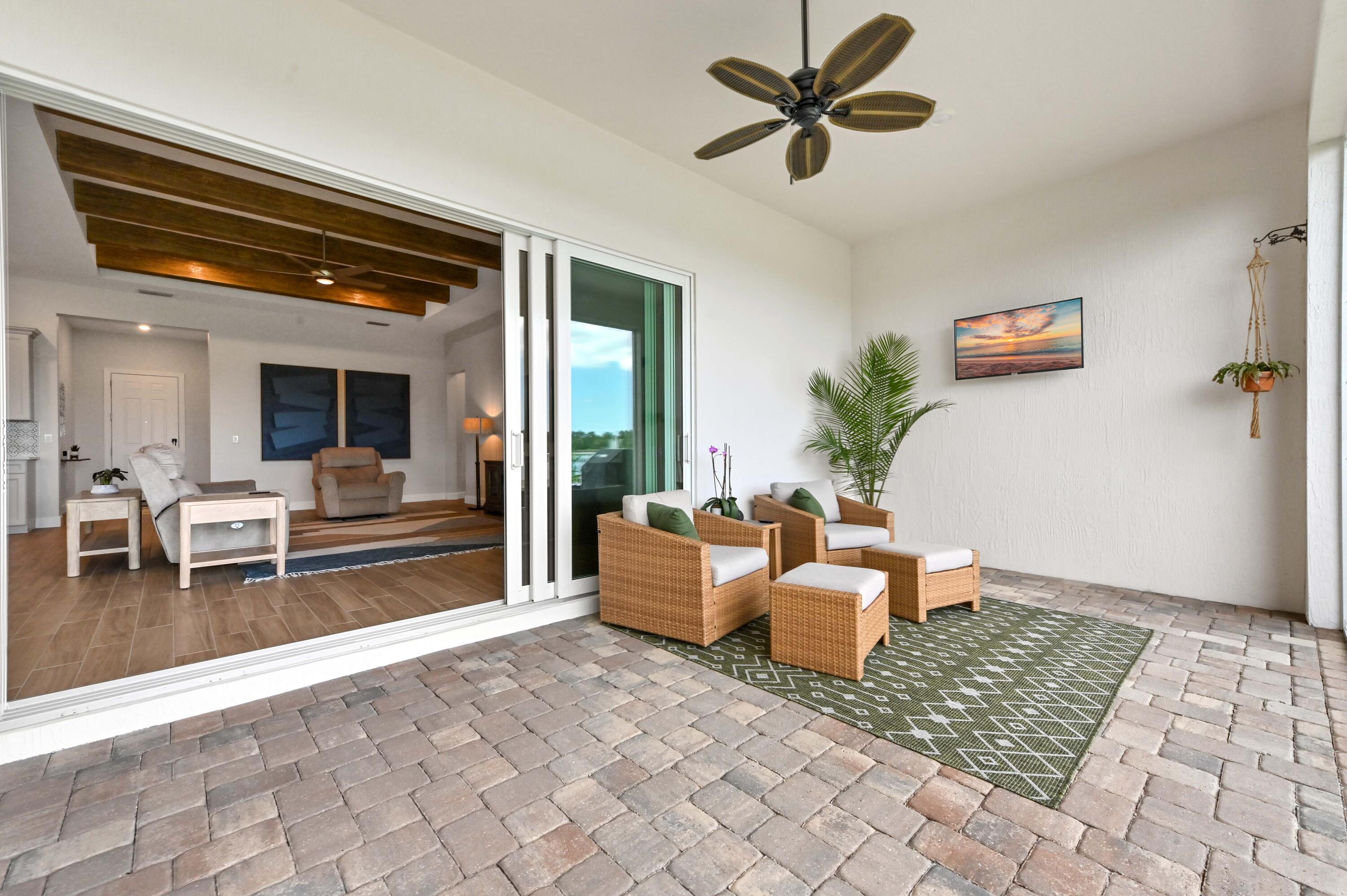 9891 Southwest Legacy Drive Stuart, FL 34997 - Photo 27 of 55 a living room with furniture
