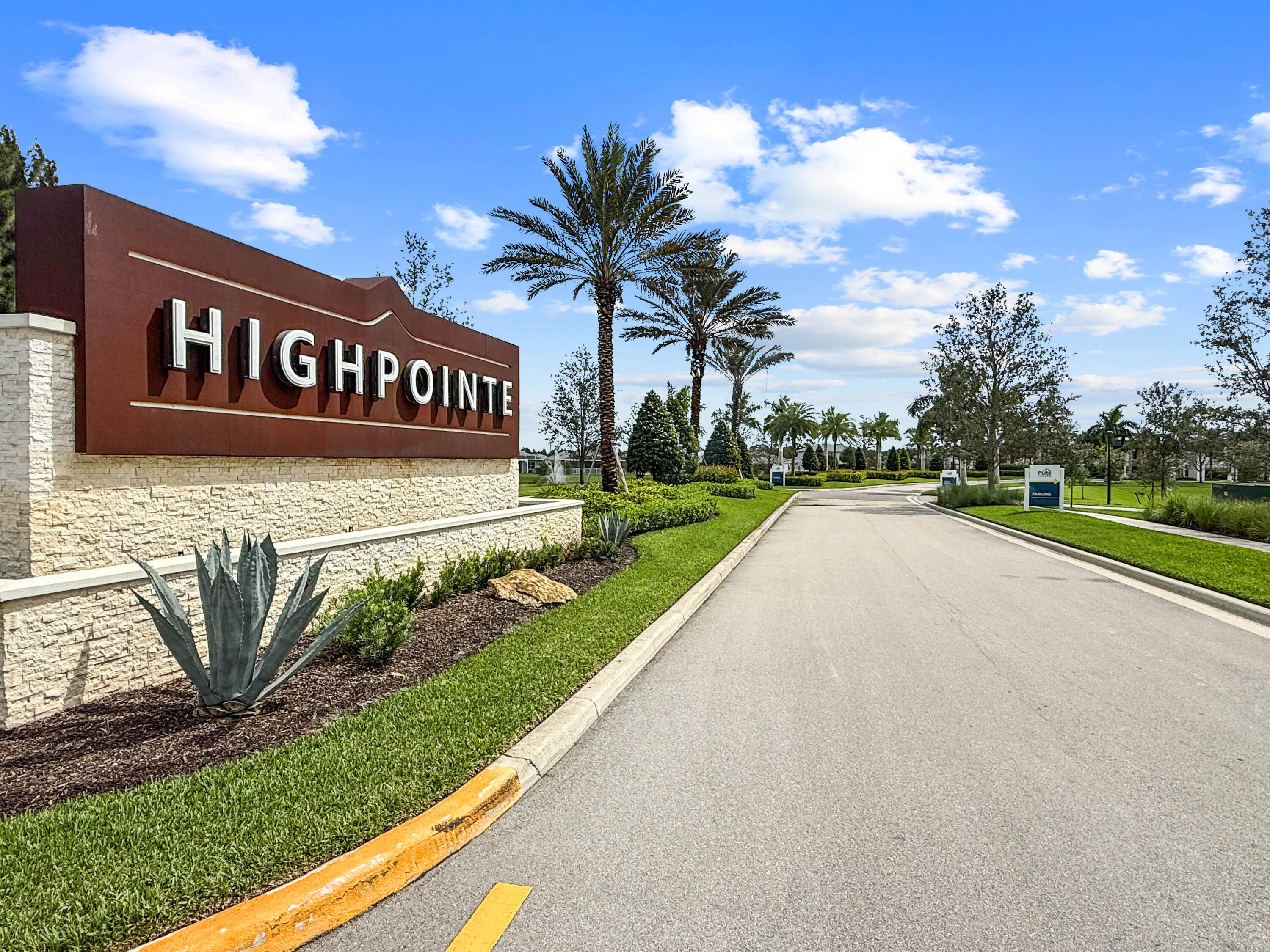 9891 Southwest Legacy Drive Stuart, FL 34997 - Photo 33 of 55 a view of a street with a building in the background