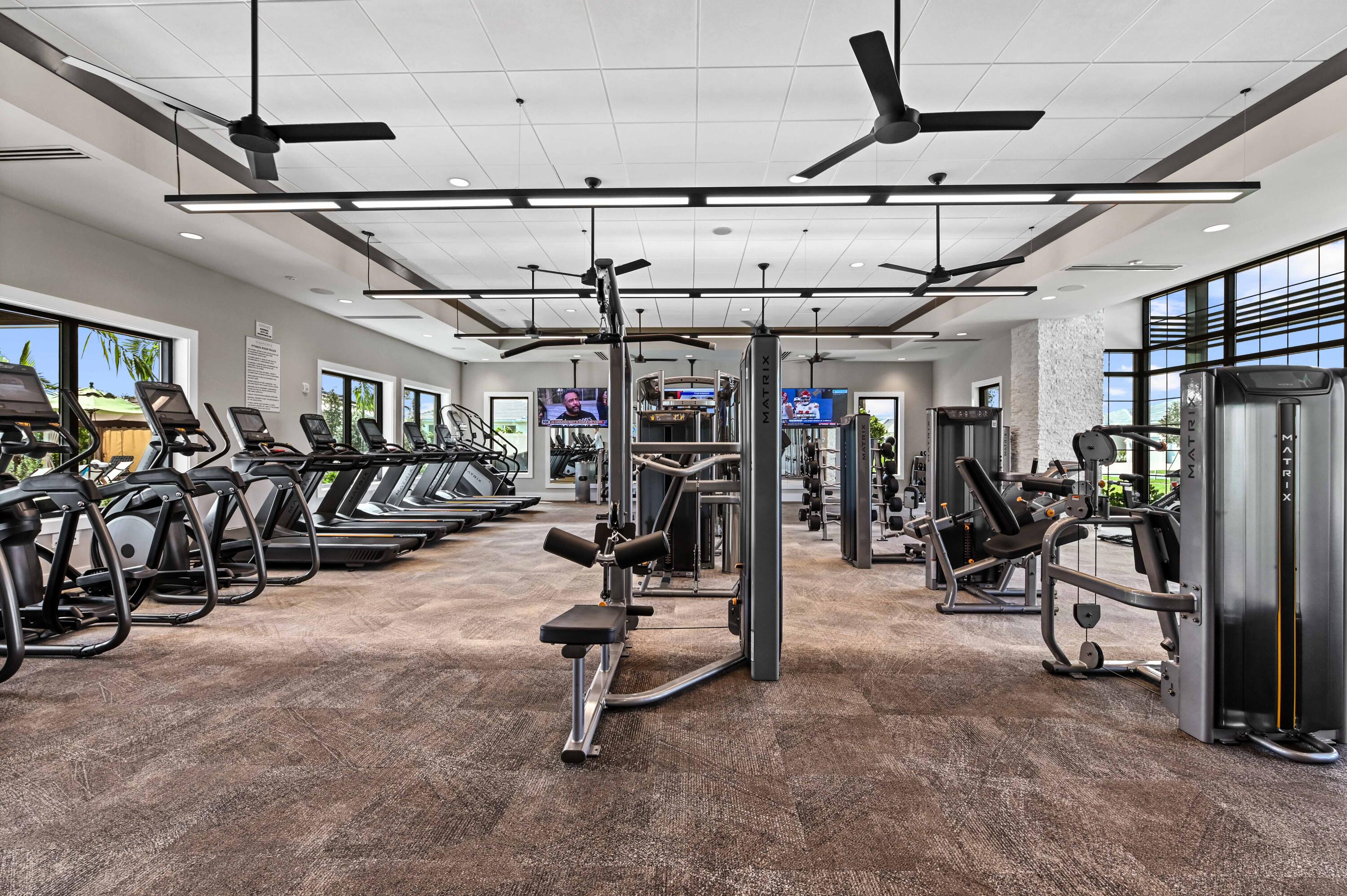 9891 Southwest Legacy Drive Stuart, FL 34997 - Photo 38 of 55 a view of a room with gym equipment