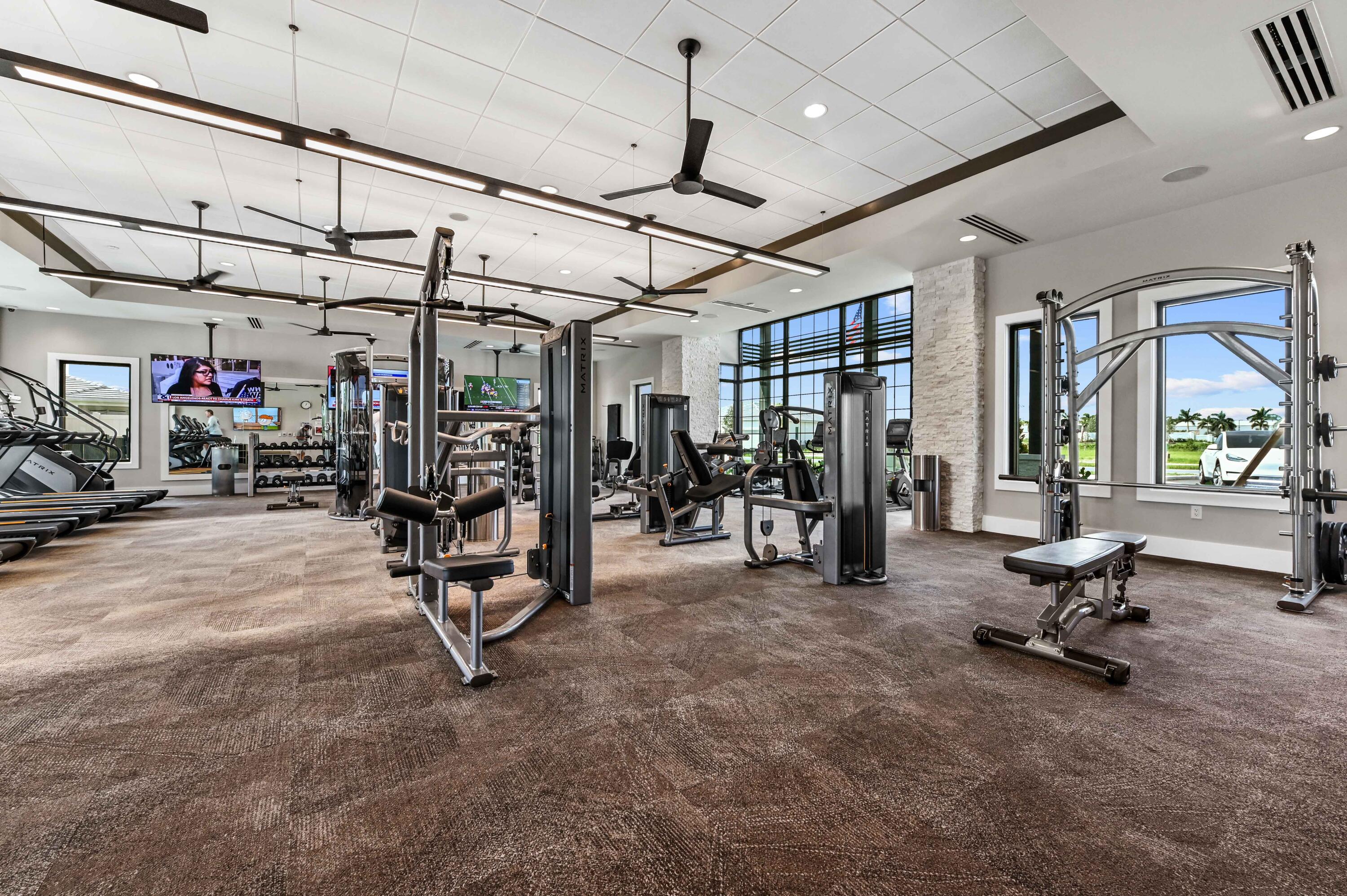 9891 Southwest Legacy Drive Stuart, FL 34997 - Photo 39 of 55 a view of a room with gym equipment