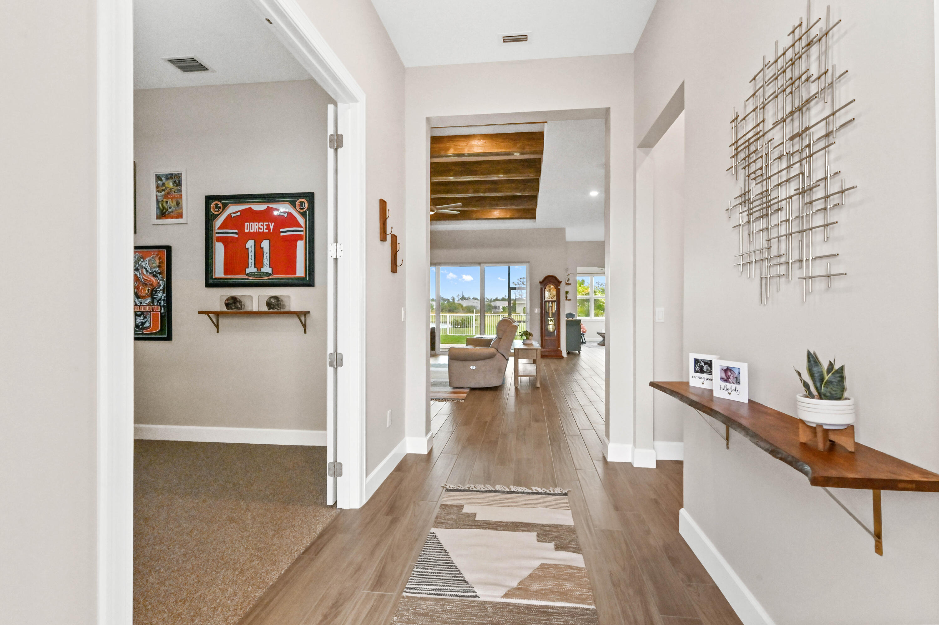 9891 Southwest Legacy Drive Stuart, FL 34997 - Photo 4 of 55 a view of living room with furniture and rug