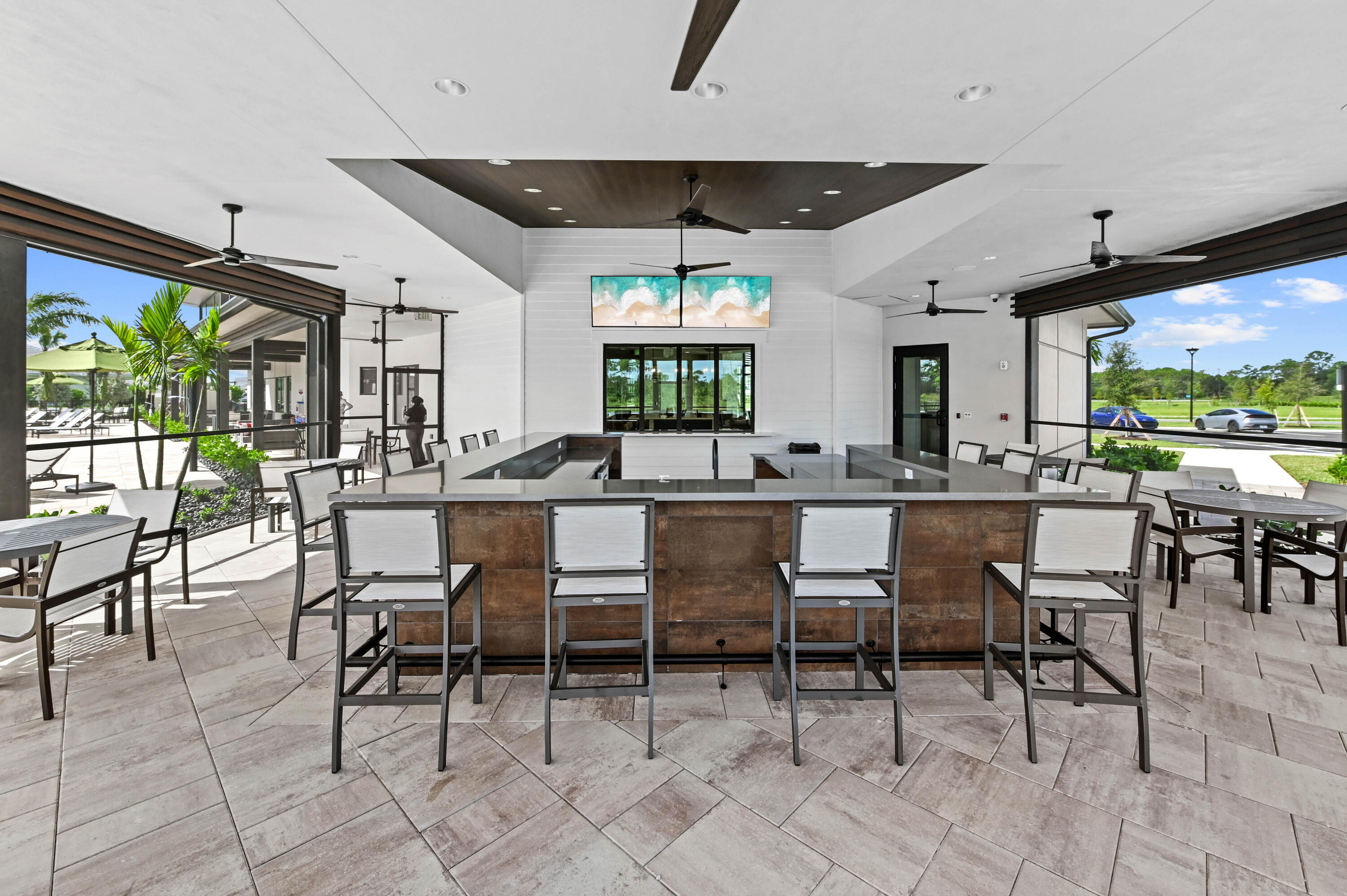 9891 Southwest Legacy Drive Stuart, FL 34997 - Photo 42 of 55 a group of people sitting in a living room