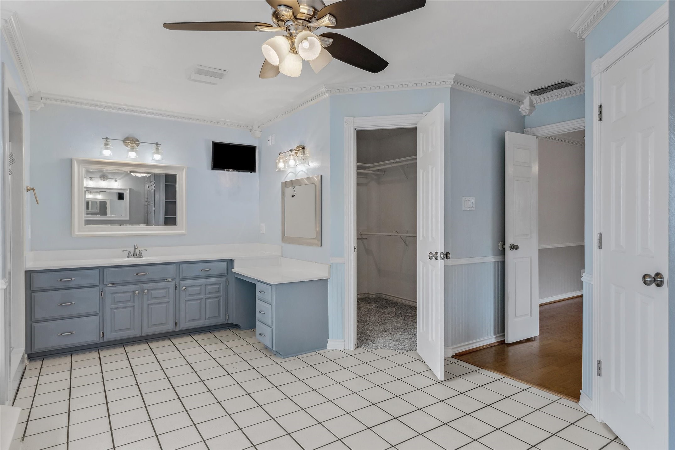 302 Erwin Street Edgewood, TX 75117 - Photo 22 of 40 a large bathroom with a sink a mirror and a shower