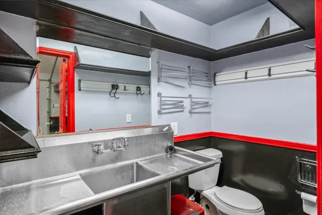 a bathroom with a sink and a toilet