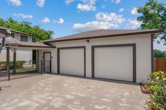 a view of a house with a garage